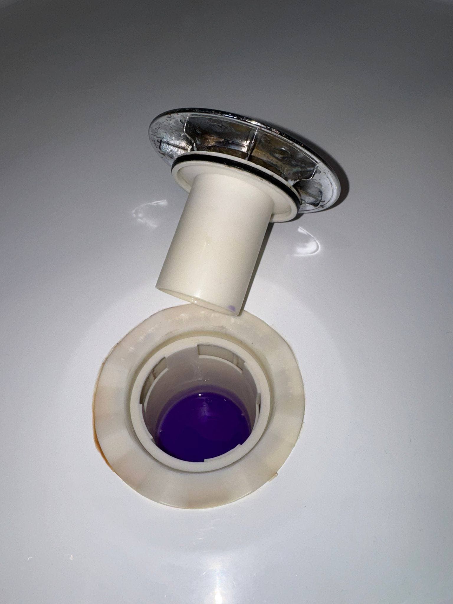 The same plug and drain cleared, cleaned and treated to a fresh finish